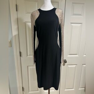 Stunning! Elegant Black and Gold Women's Dress made by Xscape.